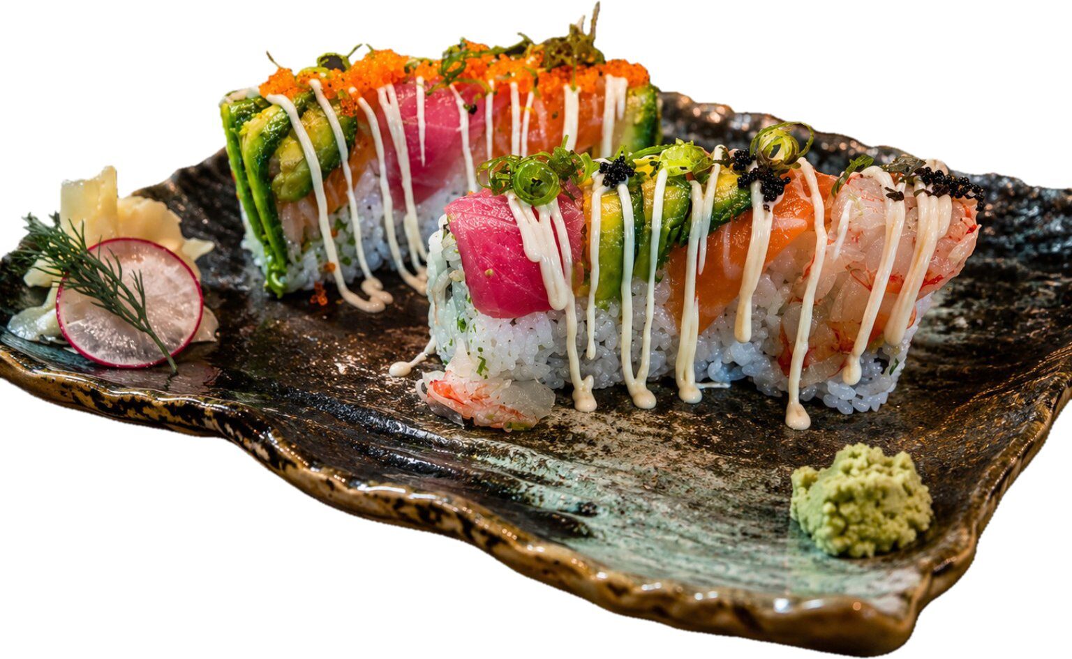 A spread of sushi platters, rolls and small plates